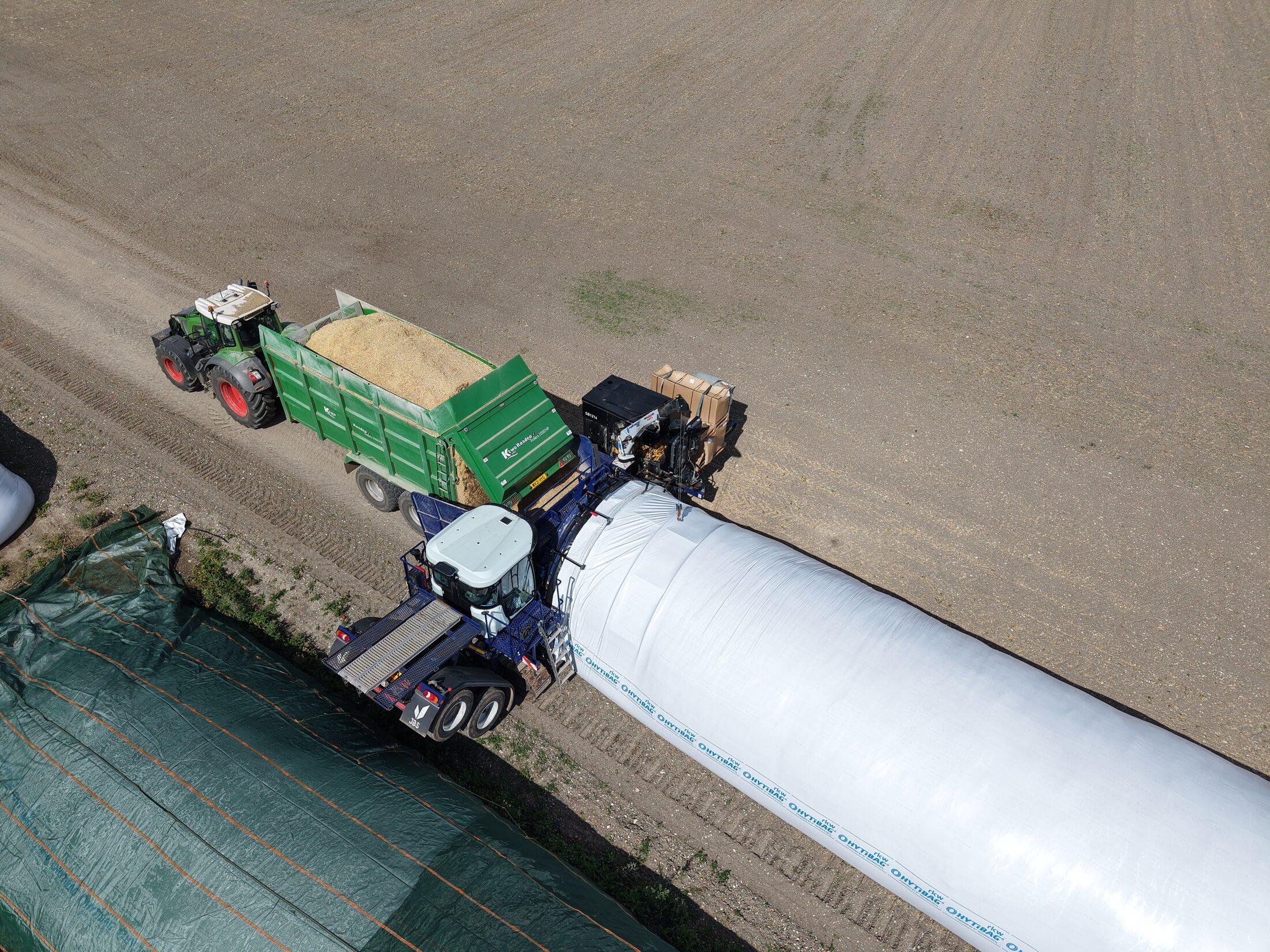 Aerial view of feed and silage bagging in progress